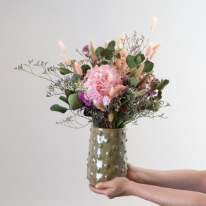 Experience the timeless beauty of our Everlasting Blooms arrangement.This stunning dried flower bouquet captures the essence of rustic charm with its delicate pastel hues and intricate textures.Perfect for adding a touch of elegance and nature to any space.